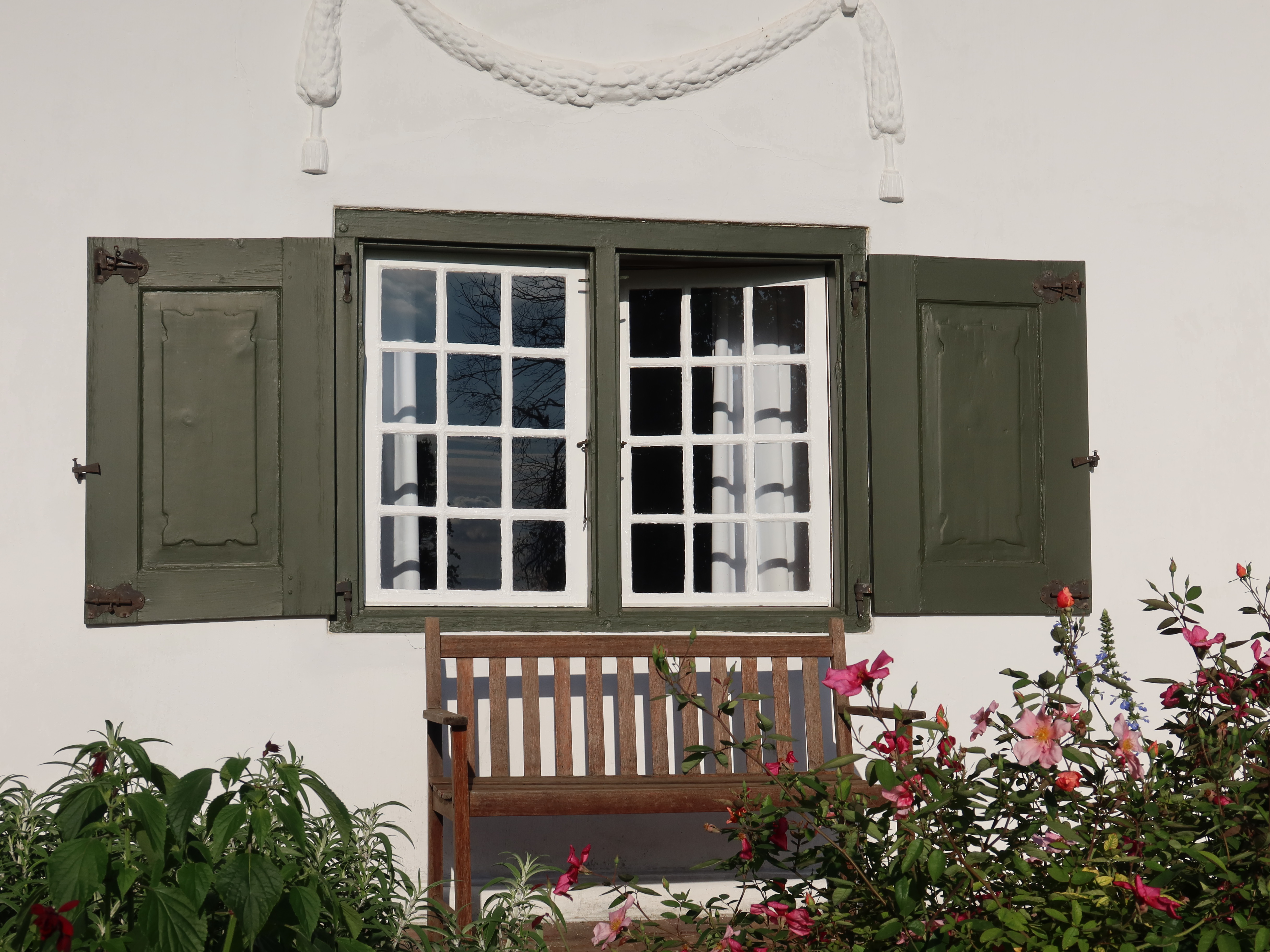 Green shutters bench